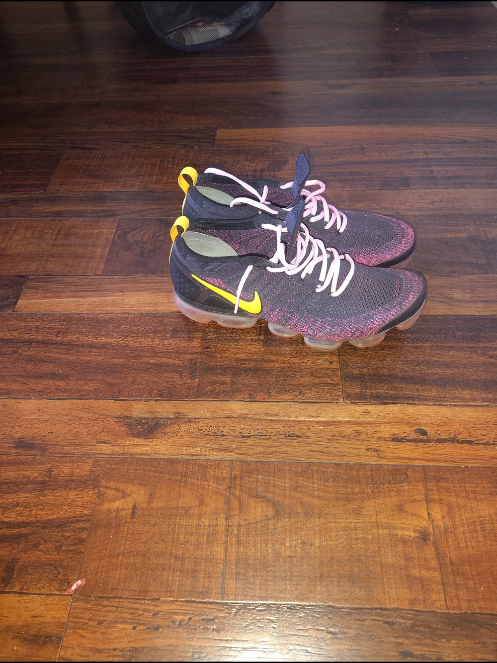 Nike Vapormax Nike men’s Black, Pink & Yellow Flyknit Sneakers.